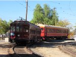 A pair of Pacific Electric cars on display during Thomas